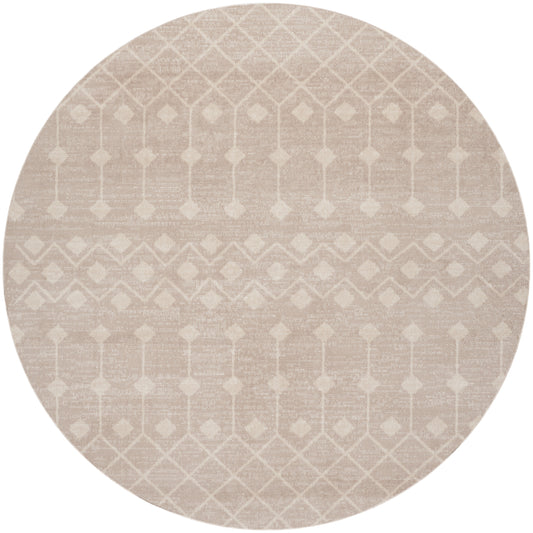 Round beige rug with subtle cream geometric lattice pattern of diamonds & lines.