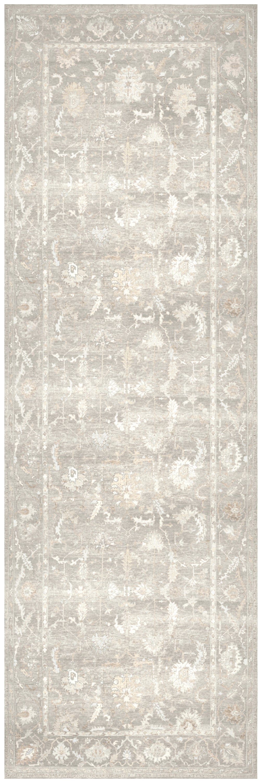 Neutral grey-beige runner rug with a faded oriental floral pattern and decorative border.