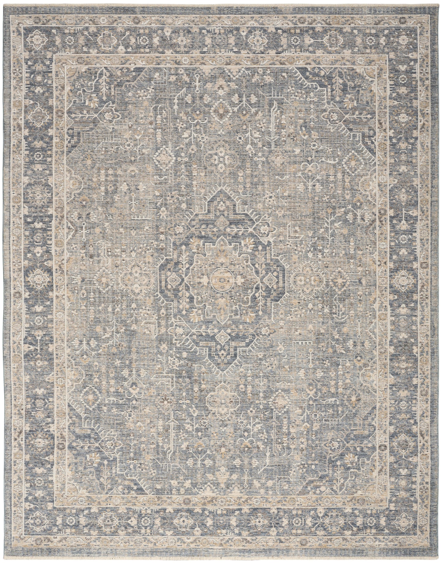 Rectangular Persian-style area rug with faded blue-gray tones, ivory field, central medallion, and ornate floral border.