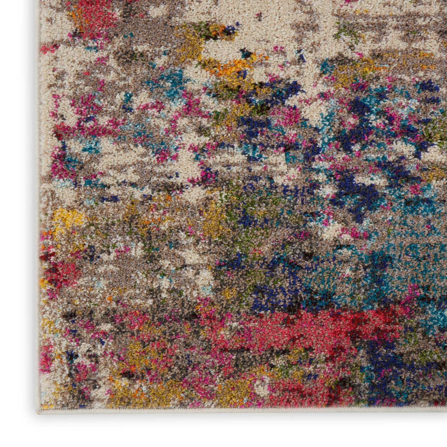 Multicolor abstract shag rug with cream base and plush pile in pink, blue, yellow, green; art-inspired living room accent