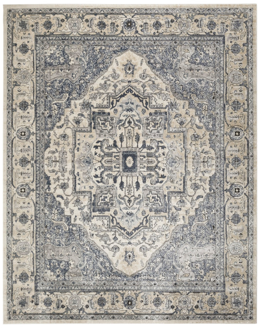Blue and ivory Persian-style area rug with central medallion, distressed vintage pattern and ornate border.