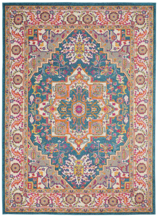 Rectangular Persian-style rug with teal central field, ornate floral medallion, and pink-cream-orange borders with intricate motifs.