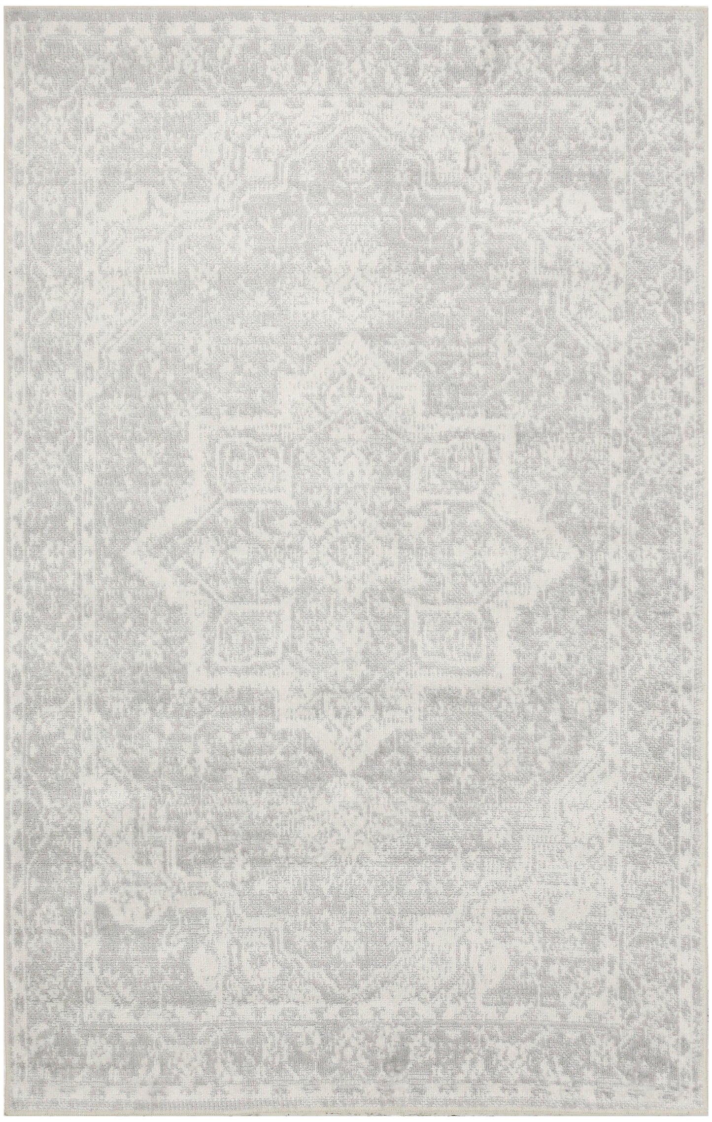 Rectangular light-gray distressed oriental rug with a faded central medallion pattern; versatile living room decor.