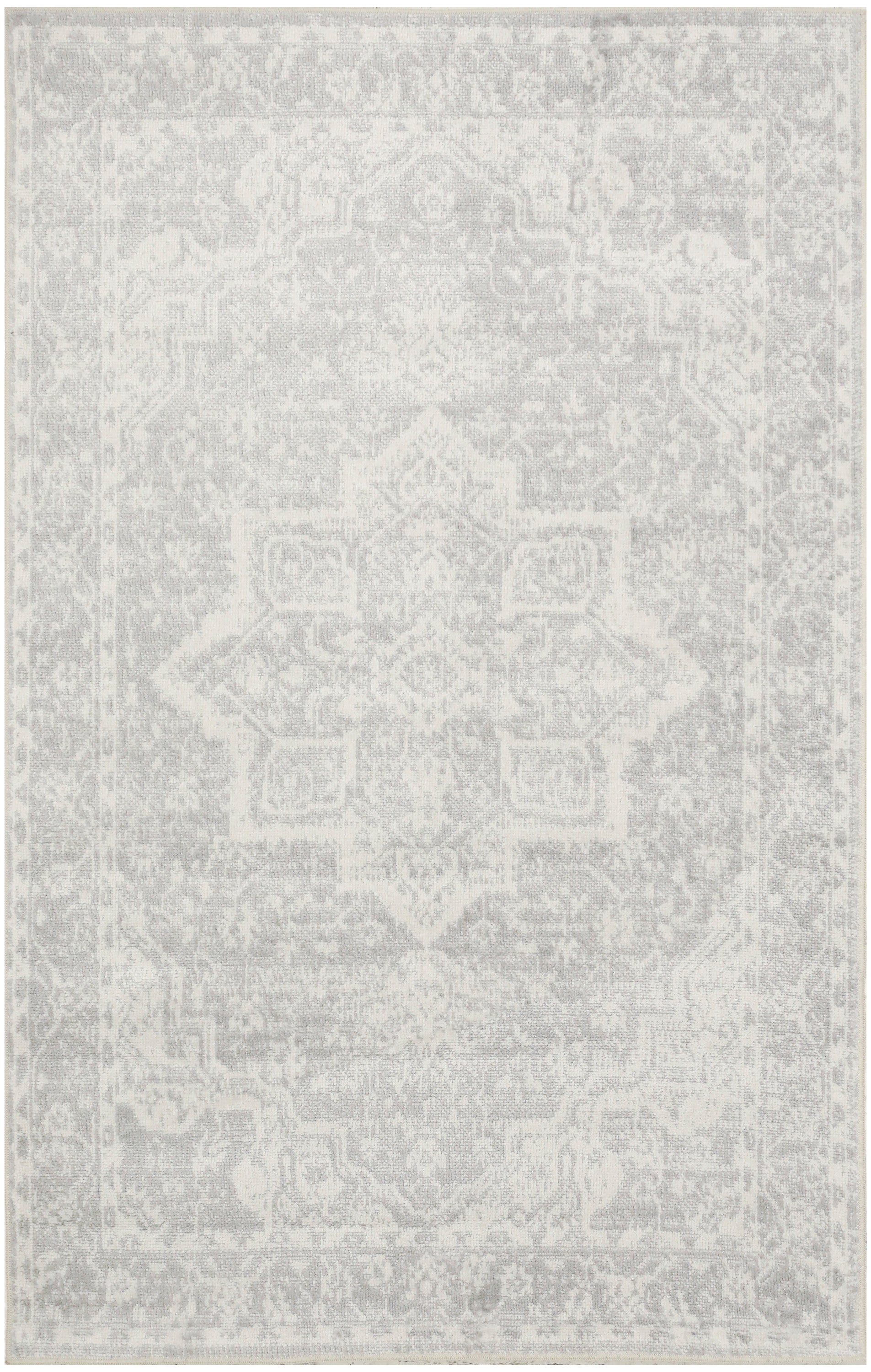 Rectangular light-gray distressed oriental rug with a faded central medallion pattern; versatile living room decor.
