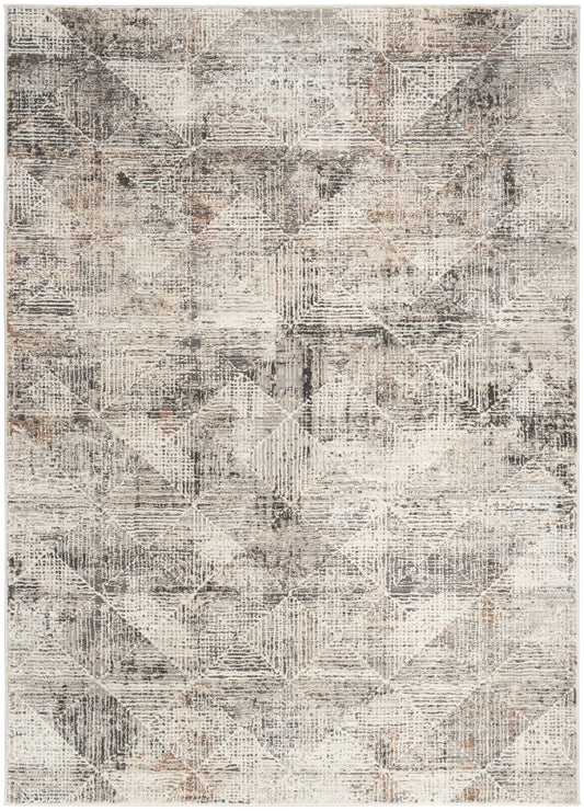 Rectangular neutral distressed geometric area rug in beige, gray and taupe with soft woven texture.