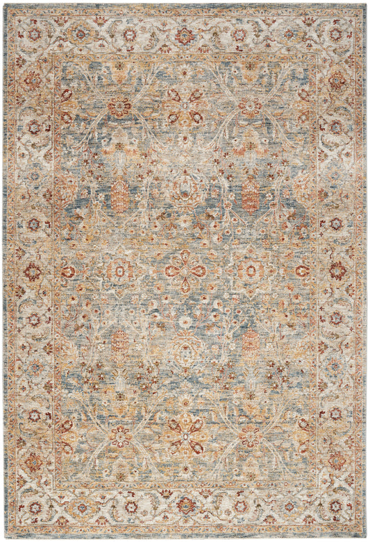 Blue-gray distressed Persian rug with ivory floral vines, rust accents & an ornate border.