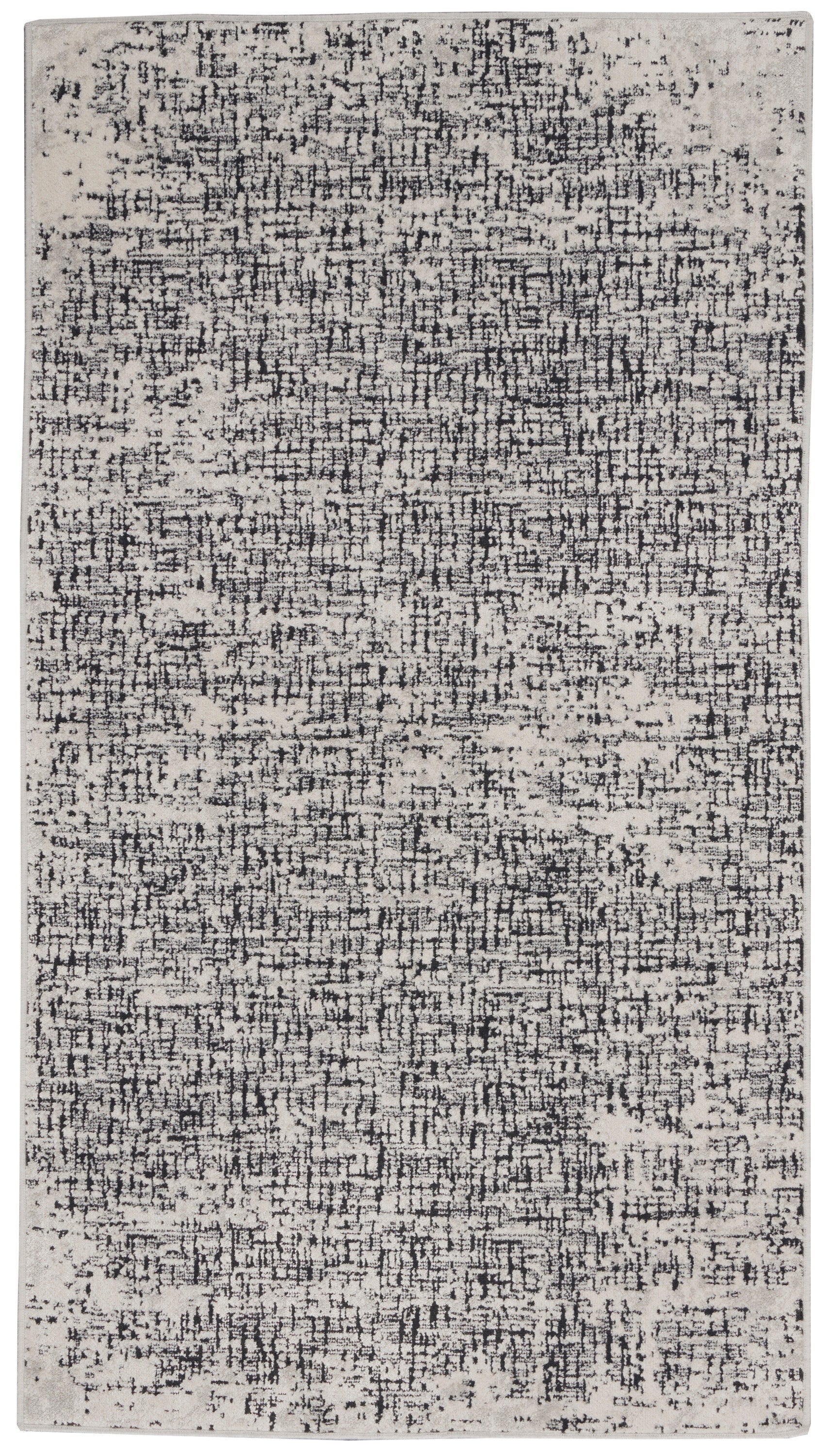 Rectangular cream rug with a black abstract distressed pattern, modern area rug for living rooms.