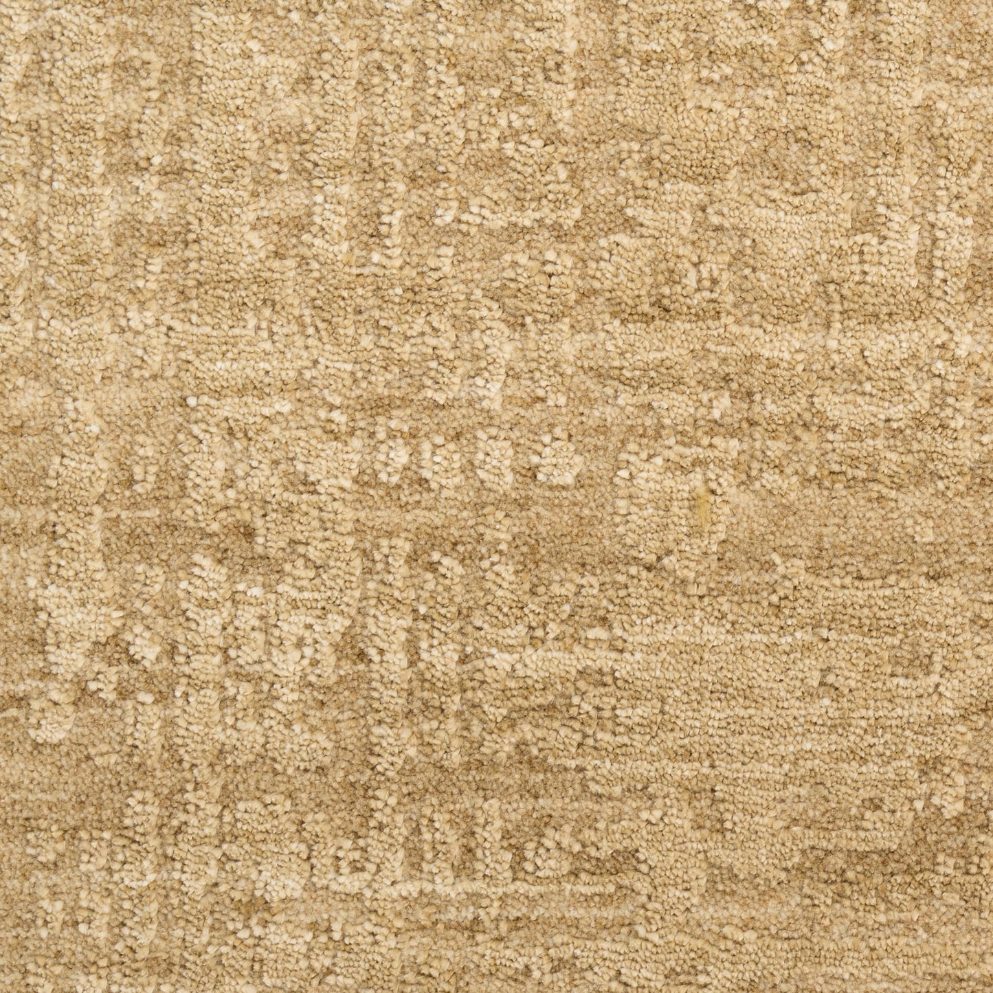 Beige textured rug with a subtle distressed geometric pattern; soft, woven surface.