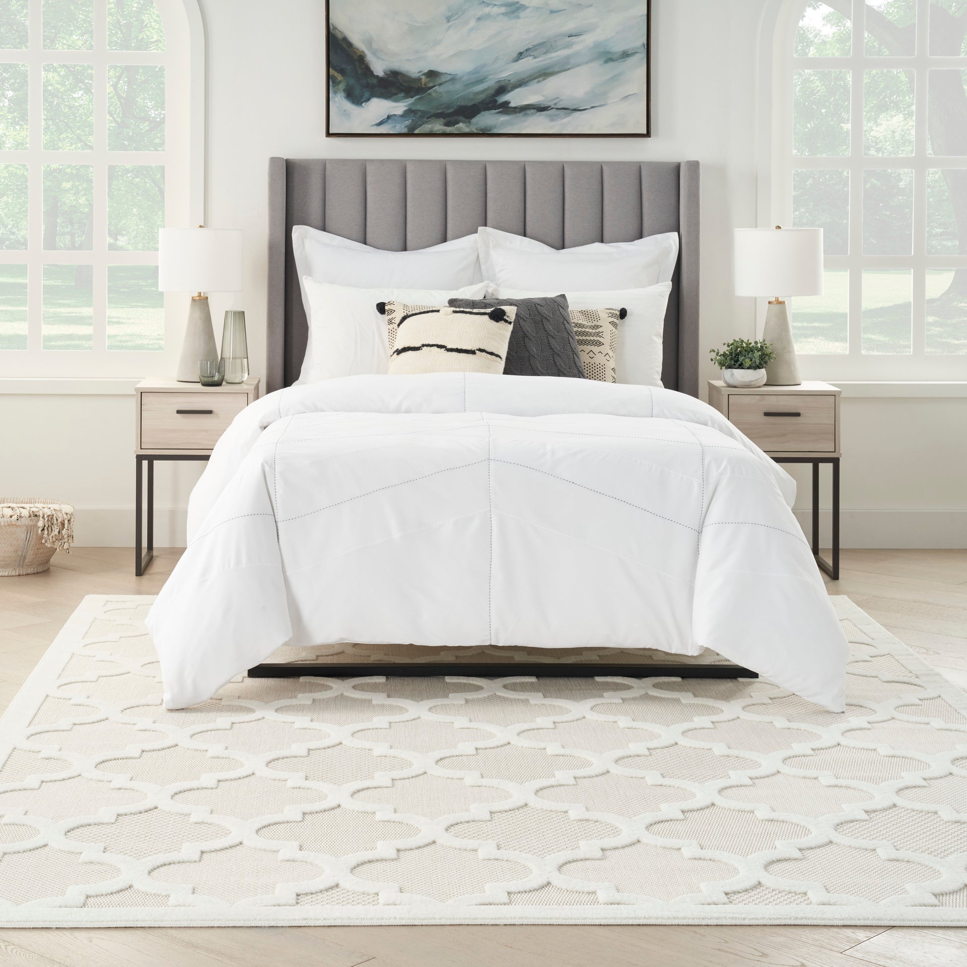 Cream geometric rug, 7' x 10'.
