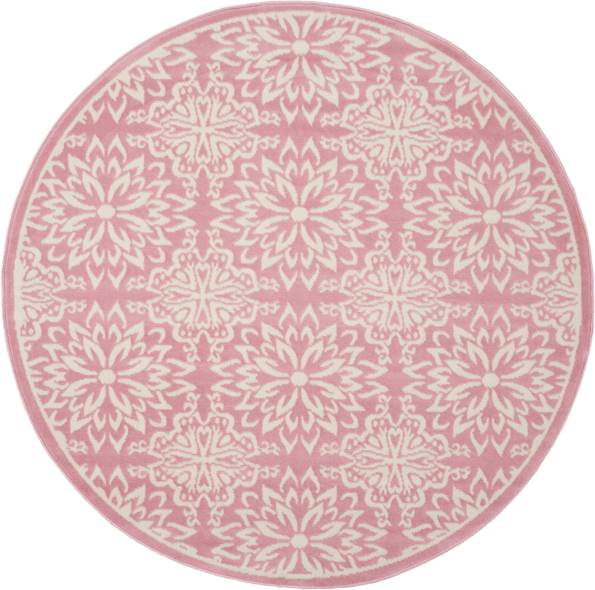 Round pink rug with white mandala floral pattern and pink border.