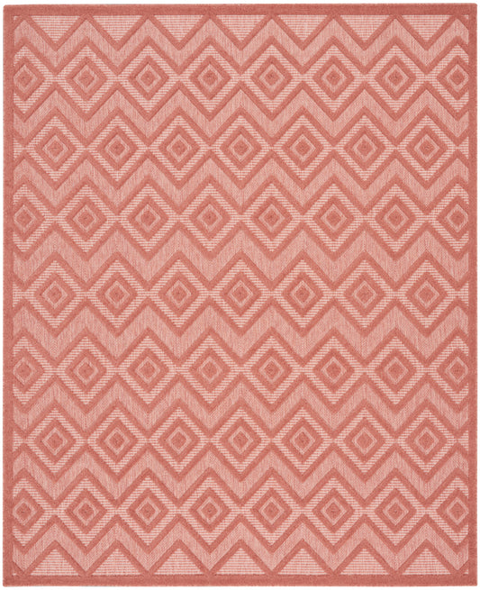 Pink rug with repeating diamond pattern in rose hues; geometric chevron border, woven textile.