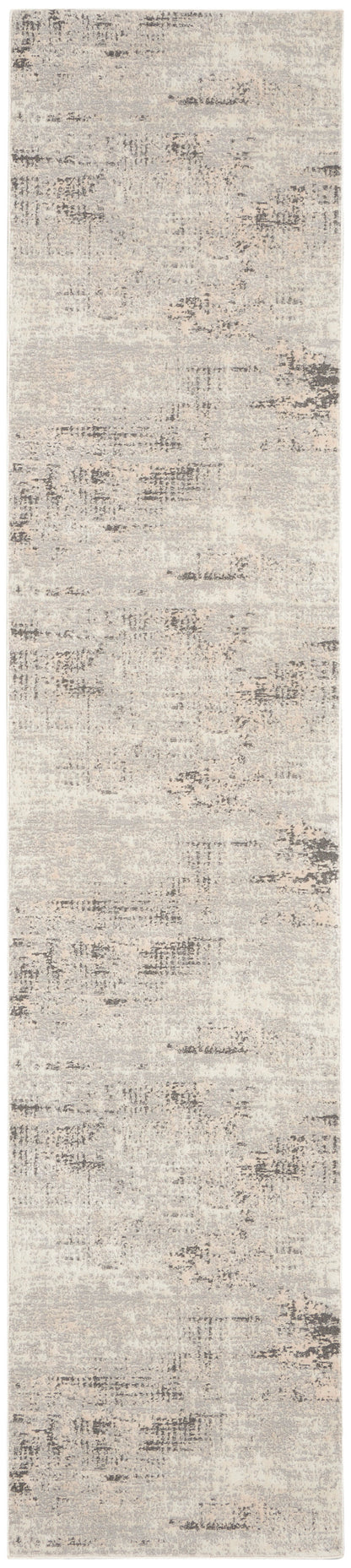 Soft beige runner rug with muted abstract gray-brown pattern.