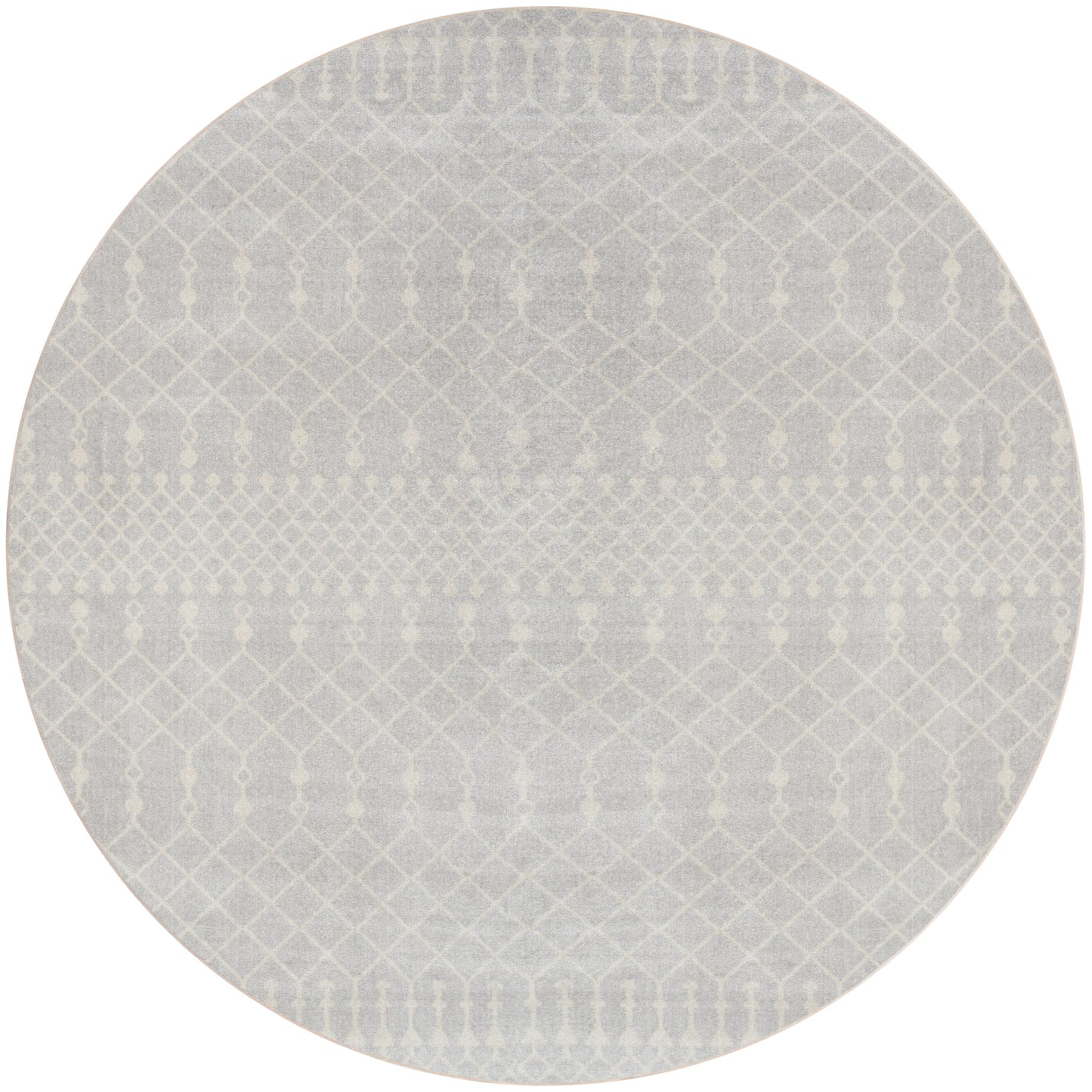 Round light gray rug with a subtle white geometric lattice pattern, Bohemian style.