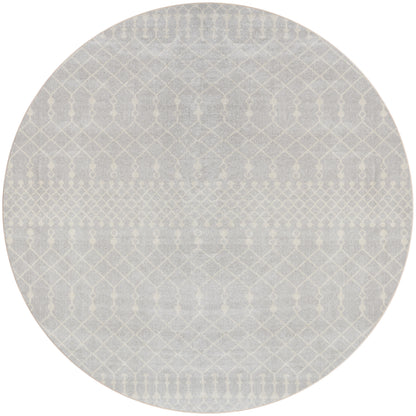 Round light gray rug with a subtle white geometric lattice pattern, Bohemian style.