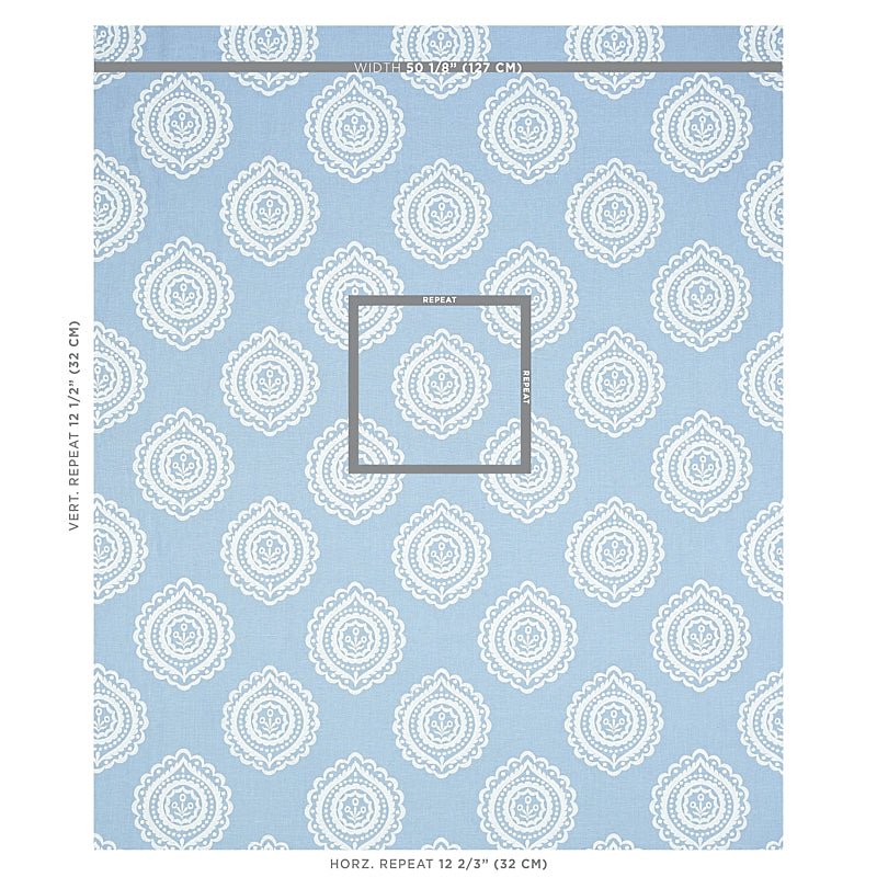 Blue linen fabric with a repeating white damask medallion pattern.