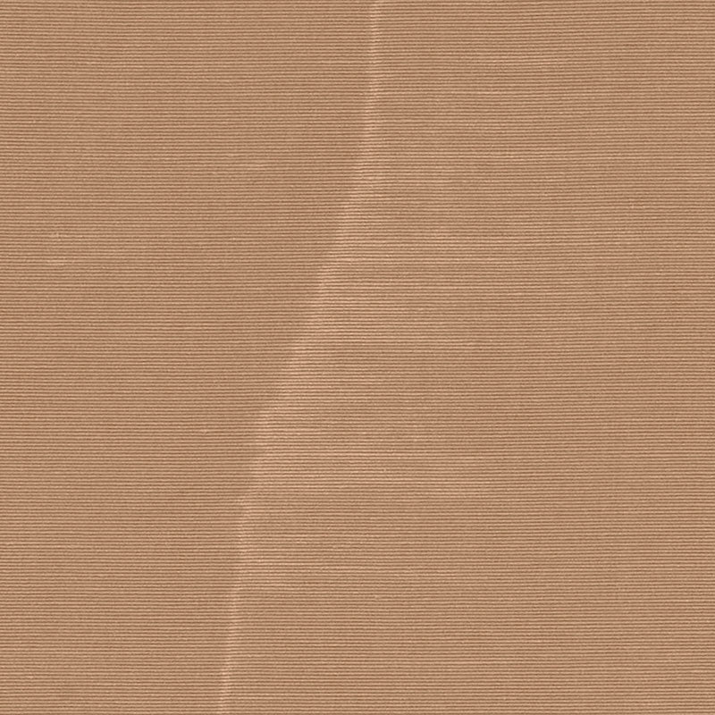Kraft brown corrugated cardboard sheet with diagonal crease and fine ribbed texture.
