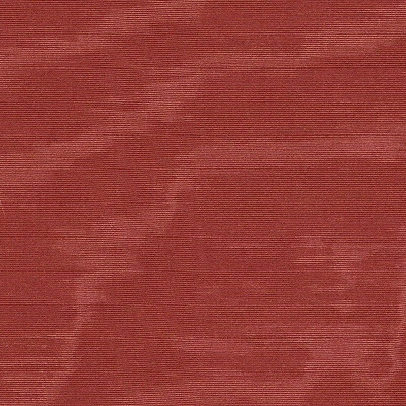 Moire fabric close-up in cinnabar red with a wavy pattern.