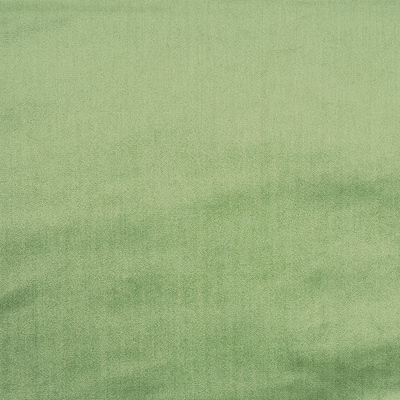 Olive green velvet fabric with soft wrinkles.