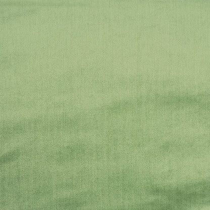 Olive green velvet fabric with soft wrinkles.