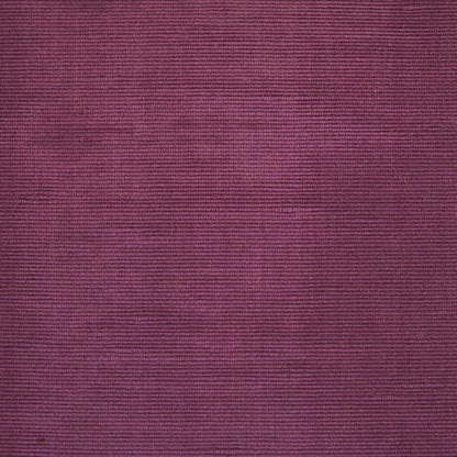 Close-up burgundy textured fabric with fine horizontal ribbing, maroon textile suitable for garments or upholstery.