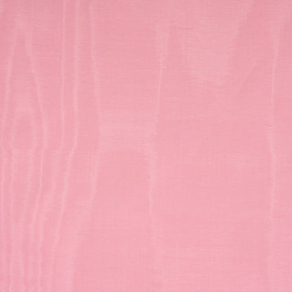 Soft pink moire pattern on a smooth decorative panel background.