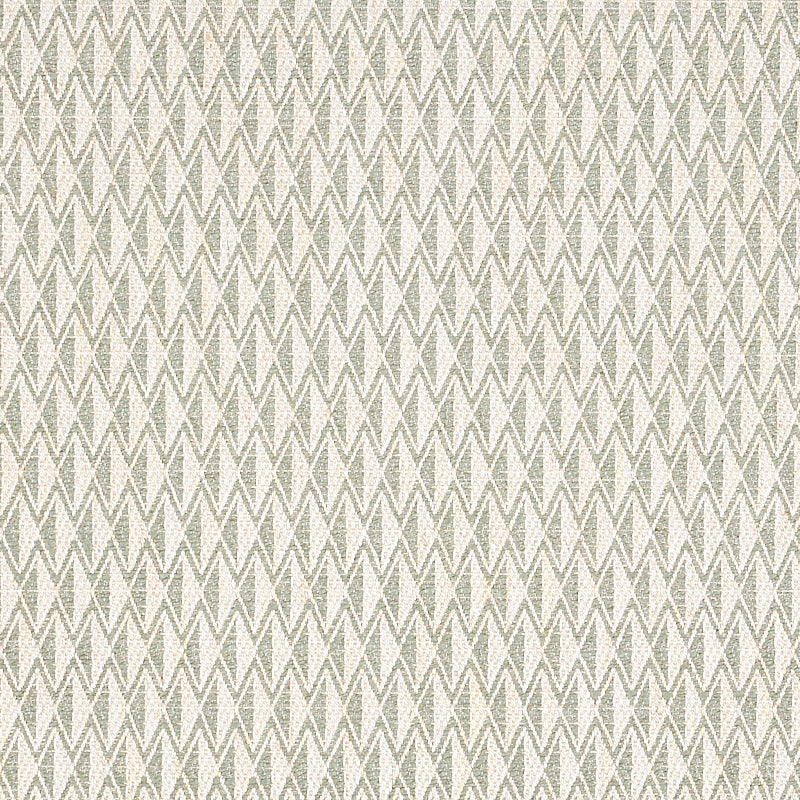 Grey and cream chevron woven fabric texture; subtle zigzag pattern for upholstery or drapery.