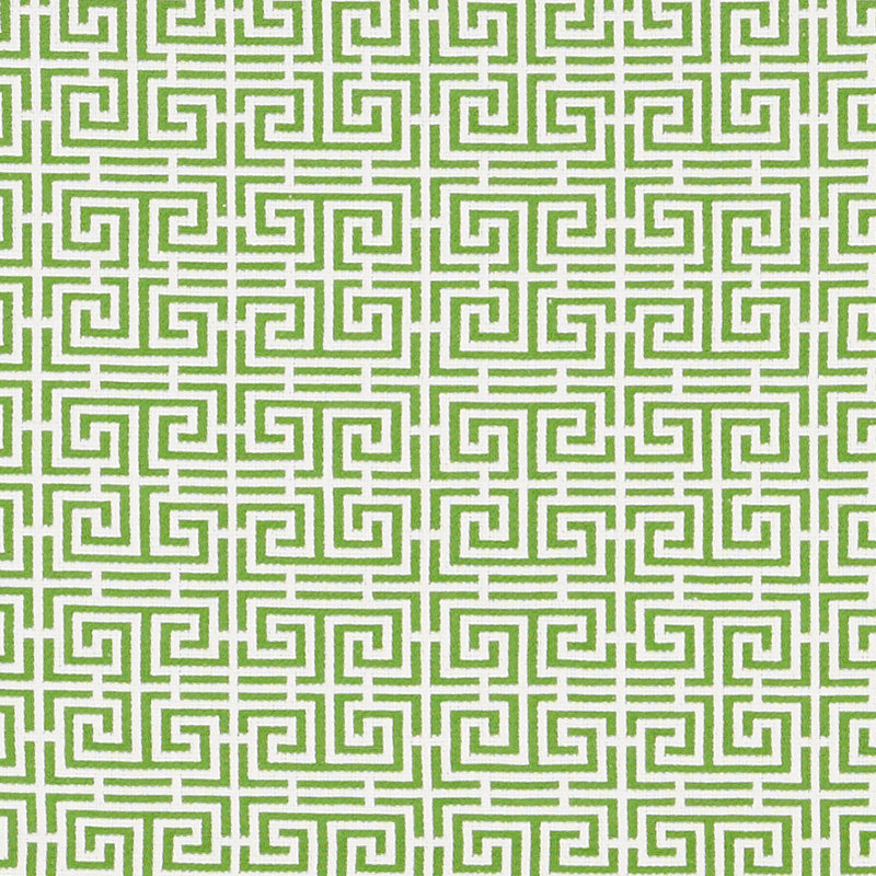 Green and white Chinois fret pattern woven upholstery fabric.