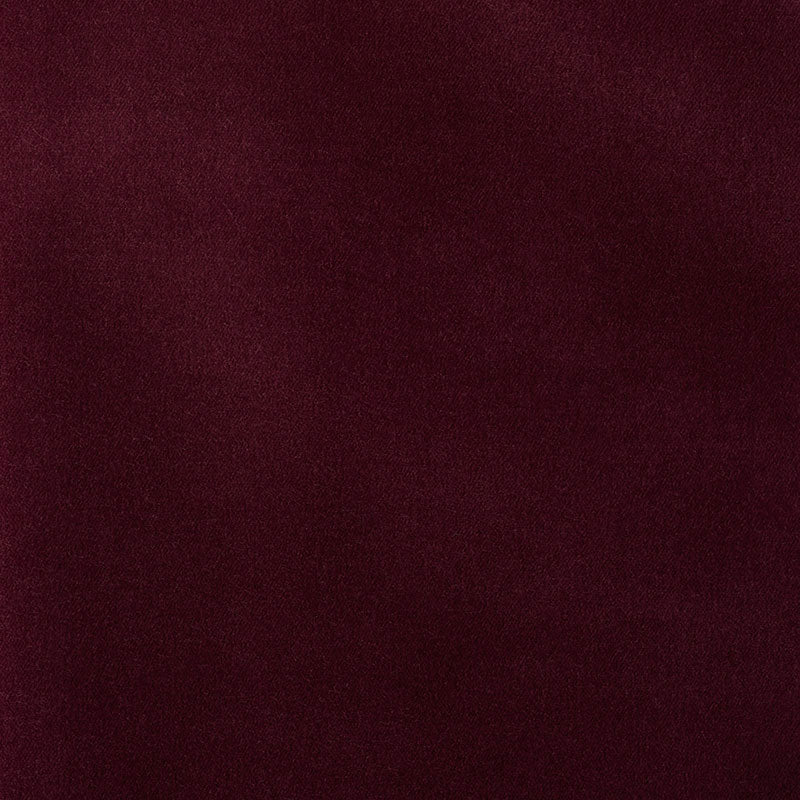 Dark plum velvet fabric swatch with soft nap and subtle sheen.