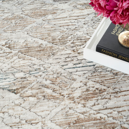 Cream patterned area rug with brown swirls; white tray with a black fashion jewelry box, a gold pendant, and pink peonies.