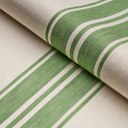 Beige woven fabric with leaf-green striped bands and white borders, rolled textile.