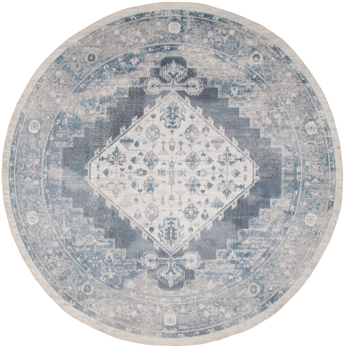 Round distressed blue and ivory rug with central diamond medallion and floral motif; vintage Persian-inspired design.