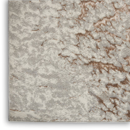 Gray and beige marbled rug with plush pile and brown veining; modern area rug.