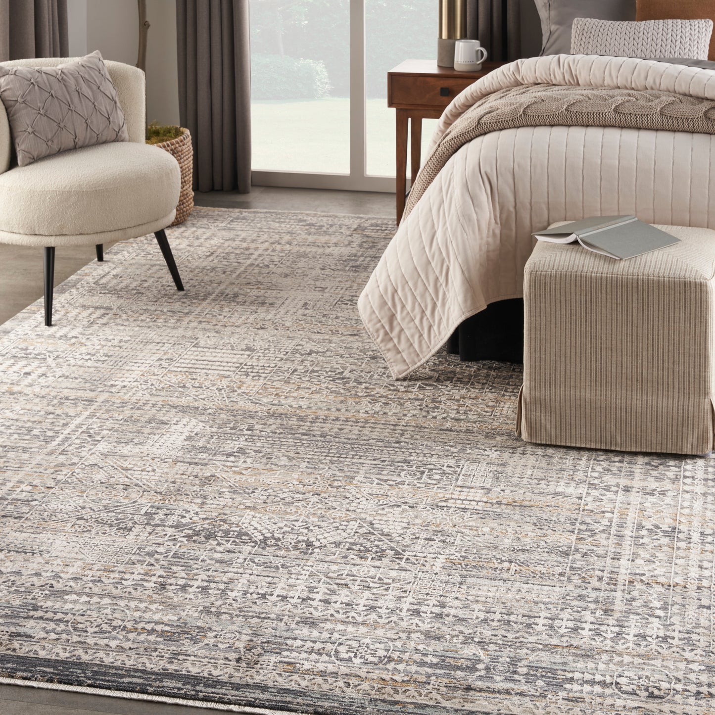 Neutral-toned vintage-style 12' x 16' flatweave area rug with a subtle geometric/medallion pattern in gray, ivory & taupe for a modern bedroom.