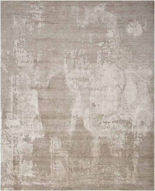 Rectangular beige rug with abstract distressed cream patches and taupe undertones, textured woven look.