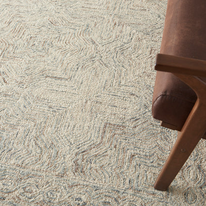 Beige textured patterned area rug (5' x 8')