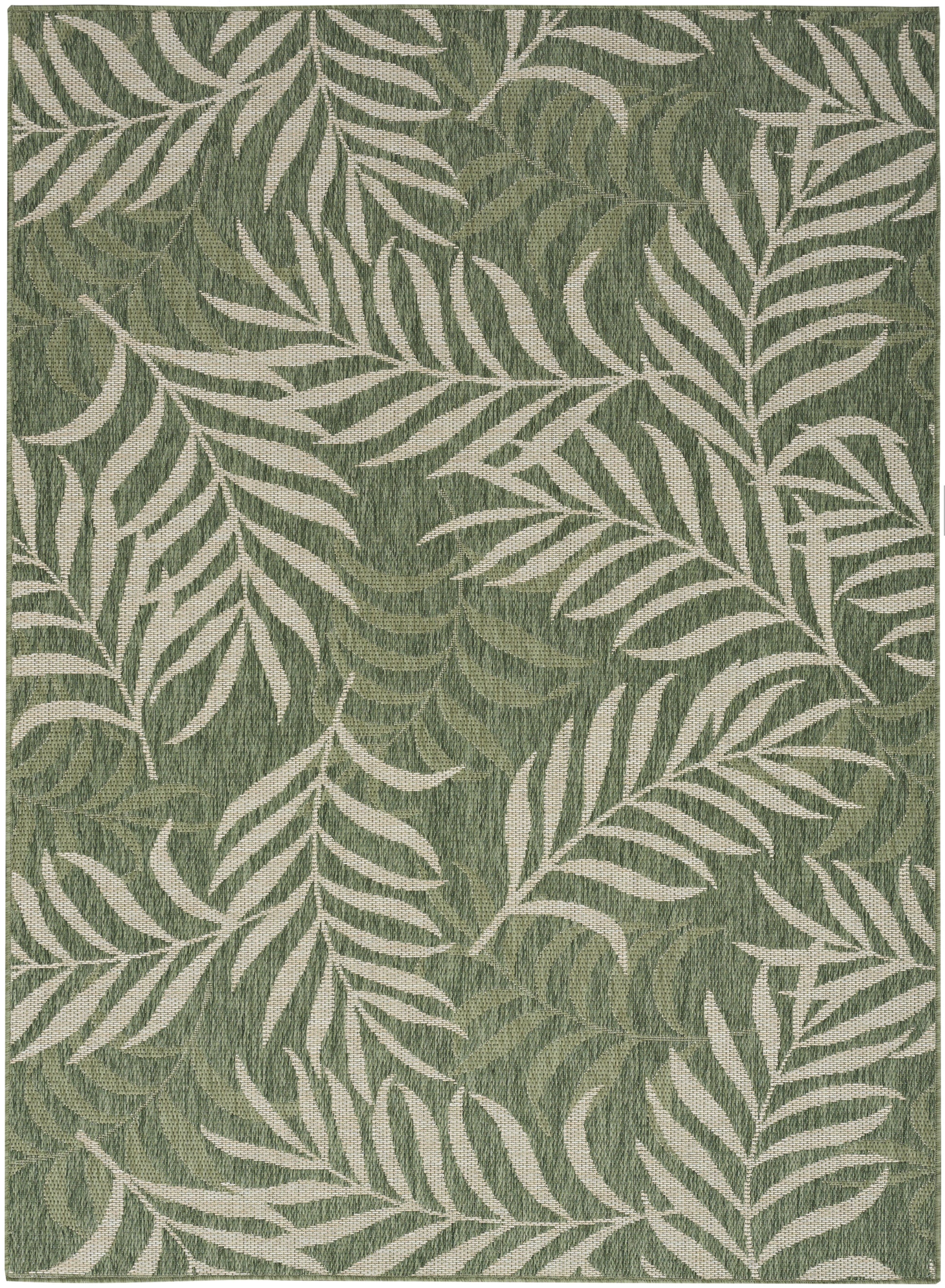 Green area rug with white palm leaf pattern, tropical botanical design.