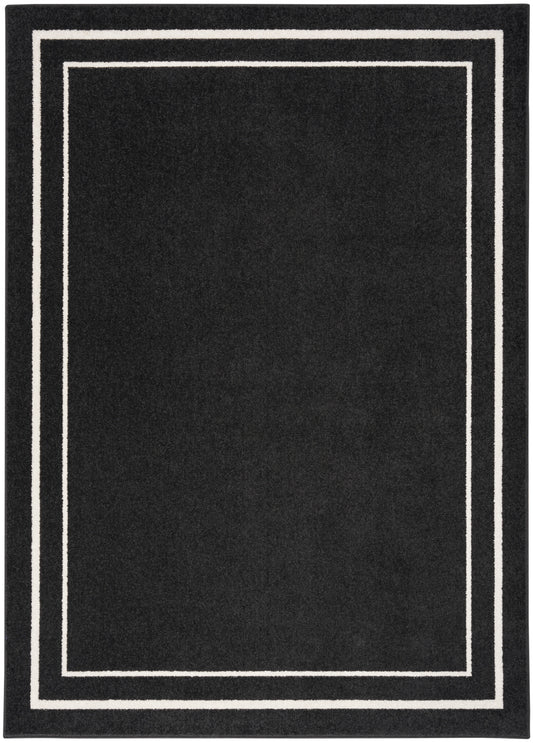 Black rectangular rug with a white double-border frame, giving a modern minimalist look.