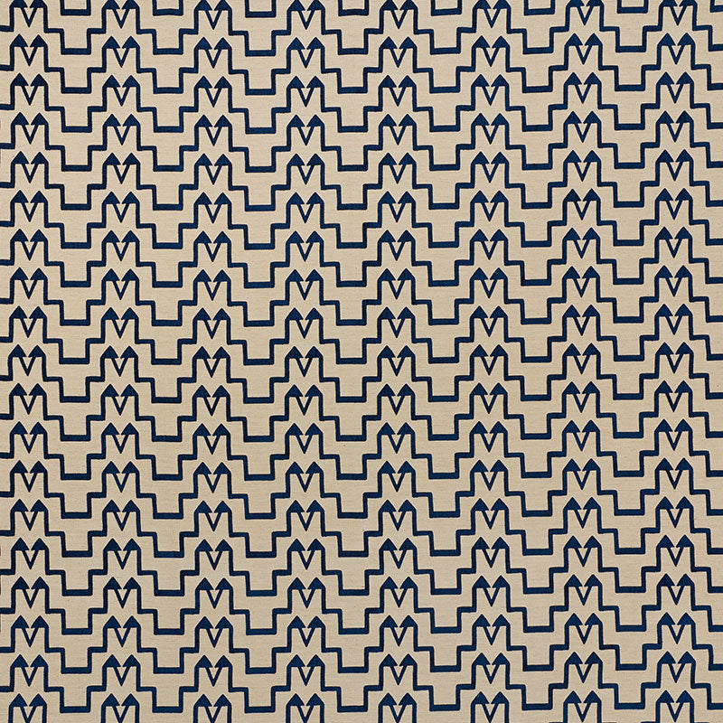 Beige background with navy geometric zigzag motif repeating in vertical rows; navy-on-cream chevron-style pattern.