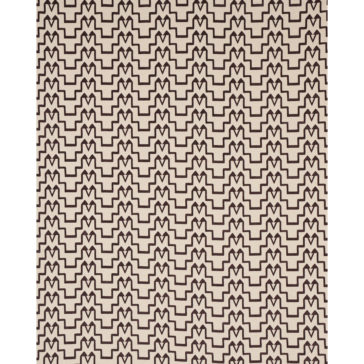 Beige rug with repeating dark brown zigzag chevron geometric pattern for modern home decor.