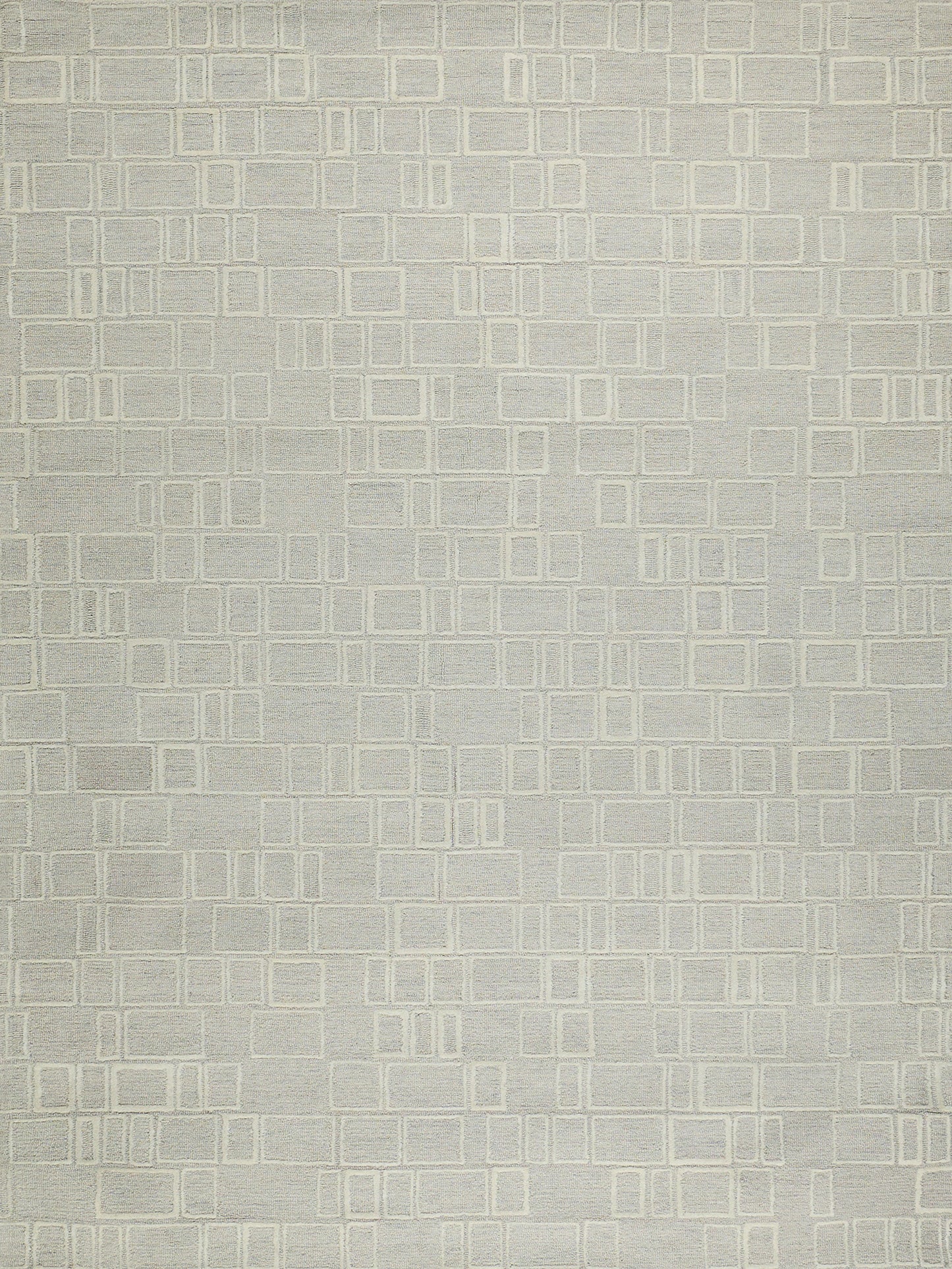 Beige indoor hand-tufted area rug with a cream outlined rectangle grid pattern in a 4' x 6' size.