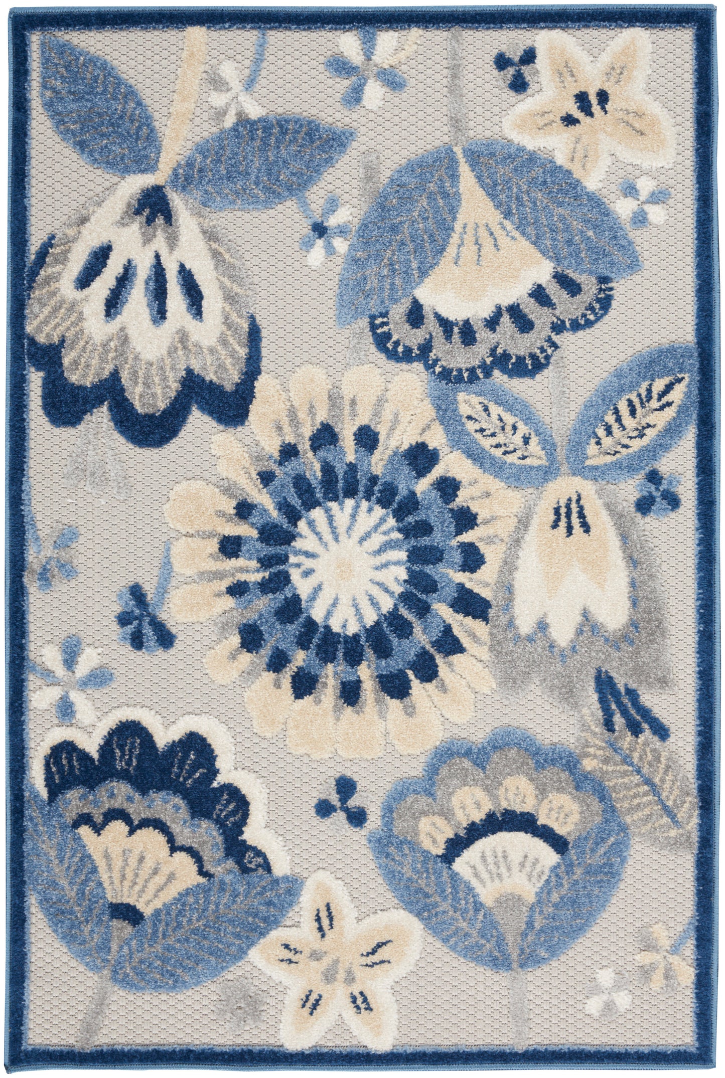 Floral area rug with blue & ivory blossoms, beige accents on light gray, navy border.