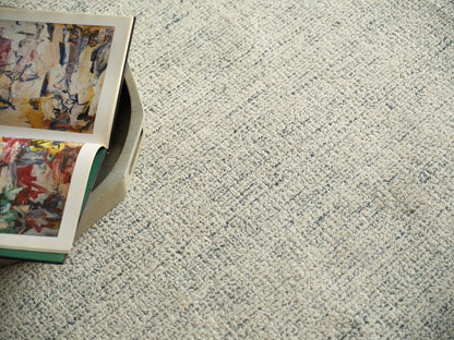 Indoor hand-tufted rug with a bright abstract pattern, size 6' x 9'.