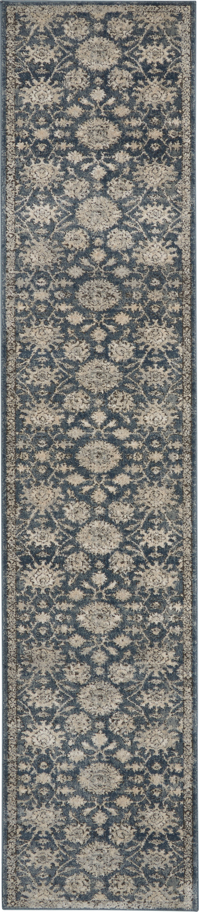 Navy blue runner rug with beige floral medallions and an ornate border in traditional oriental style.