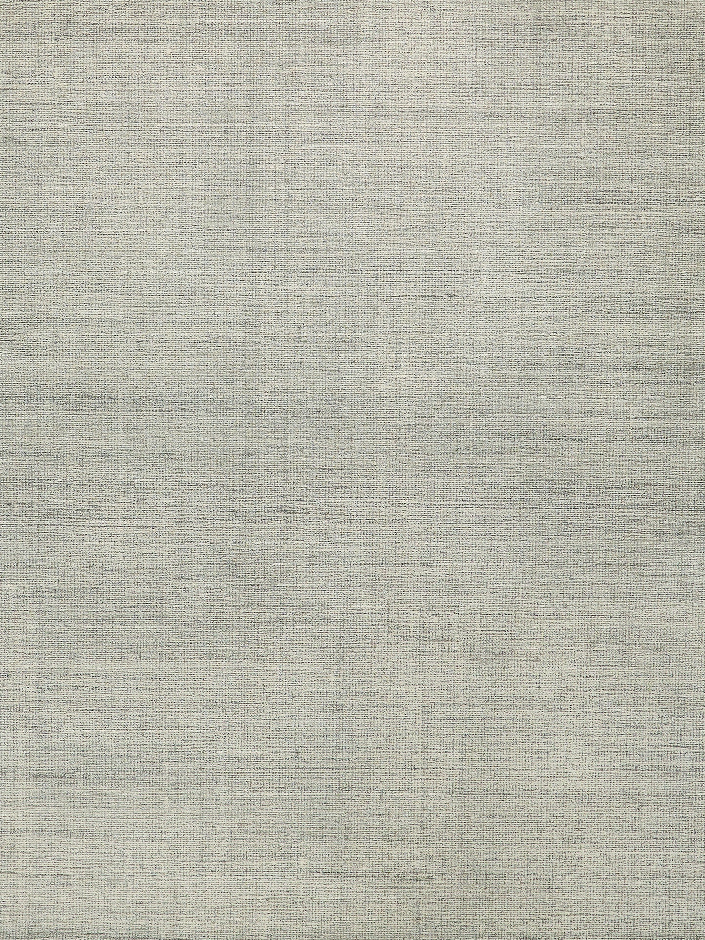 Beige-gray hand-tufted indoor rug with a subtle woven pattern and soft pile.