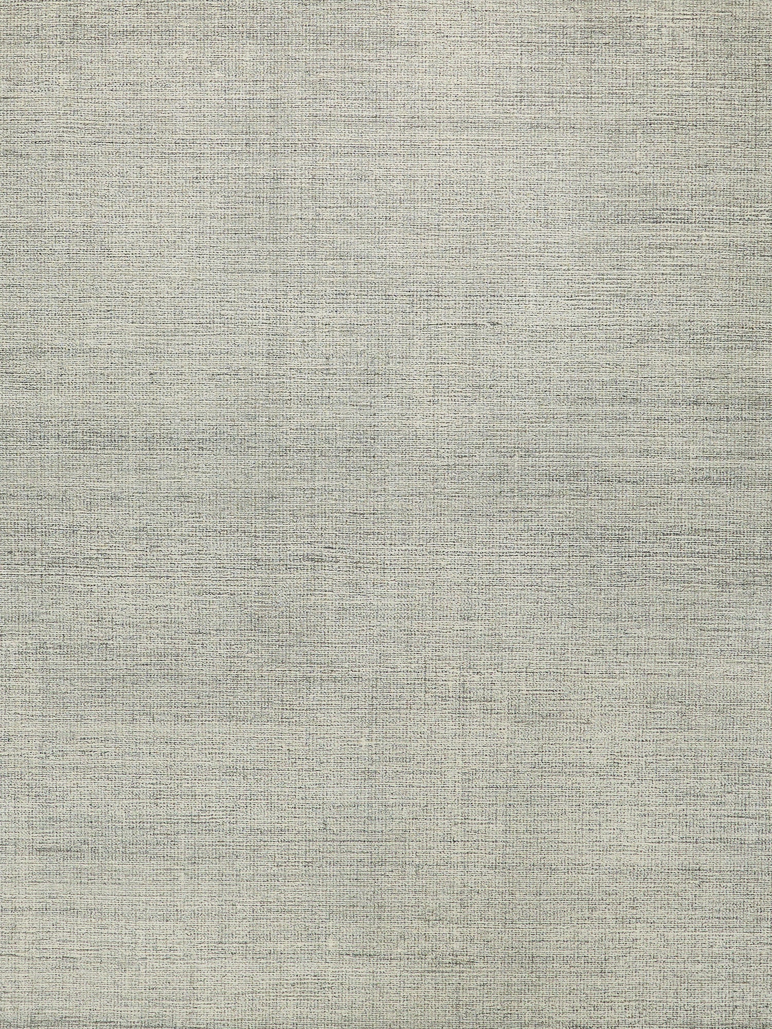 Beige-gray hand-tufted indoor rug with a subtle woven pattern and soft pile.