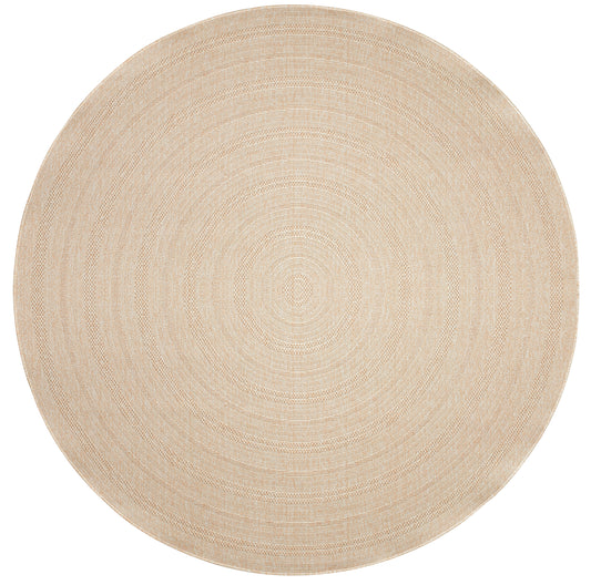 Round natural beige jute rug with concentric woven rings.