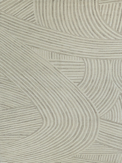 Beige area rug with abstract, wavy linear pattern and textured stripes.