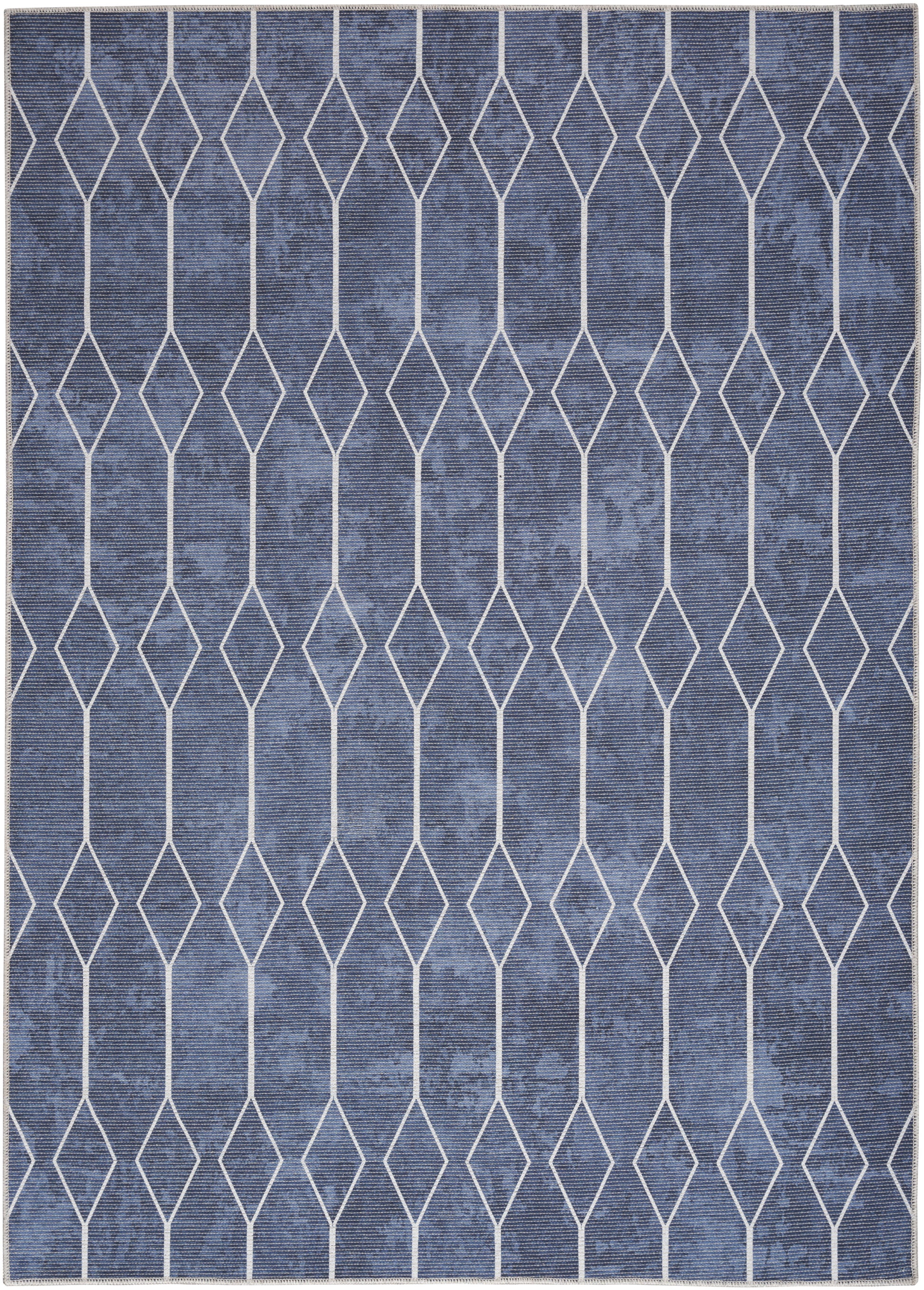 Blue woven rug with white diamond lattice pattern; modern geometric decor for living rooms.