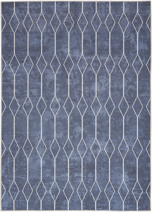 Blue woven rug with white diamond lattice pattern; modern geometric decor for living rooms.