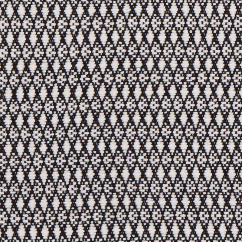 Black & white geometric knit fabric with tiny diamond motifs; fine textured material for apparel or accessories.